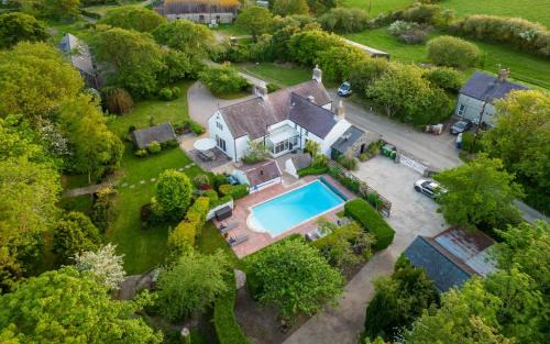 Plas Newydd with Swimming Pool, Fire Pit, and Log Fires