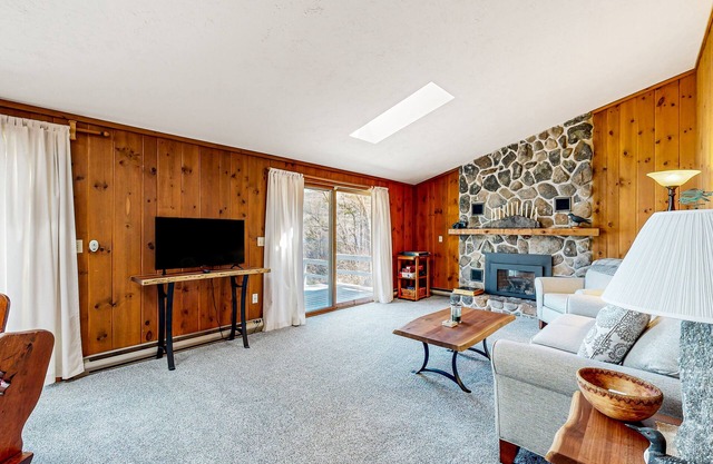Pond & mountain view cabin with fireplace, workstation, W/D, deck, & internet