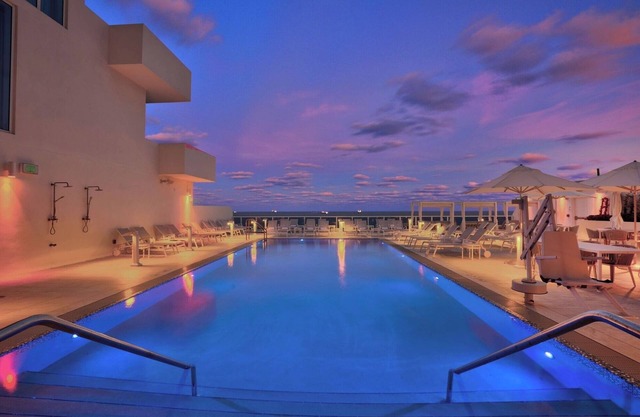Poolside Paradise with Marina Balcony, Steps to Beach Place Entertainment