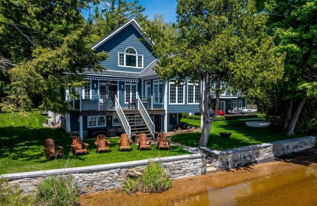 Premium family lakefront escape; 2 cottages, sandy shoreline, hot tub and more!