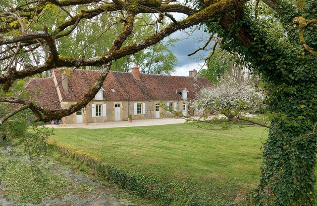 Pretty farmhouse on the edge of a village