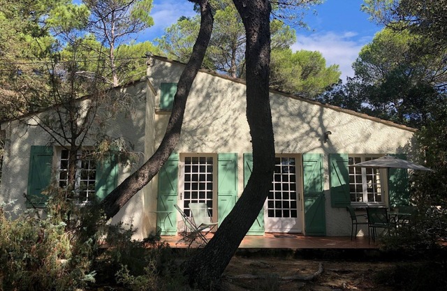 Pretty holiday home in the middle of a pine forest with fully enclosed garden.