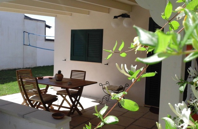 Pretty little house by the sea surrounded by greenery in the center of Porto Badisco.