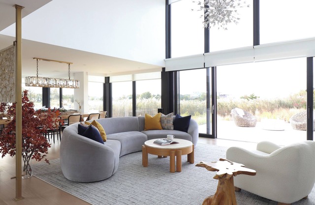 Pristine 6-bedroom waterfront property with a private dock in Southampton