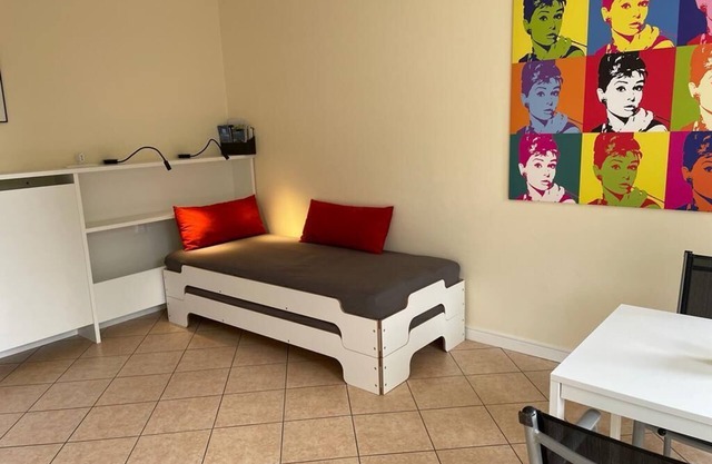 Private apartment with a balcony and roof deck close to the lake