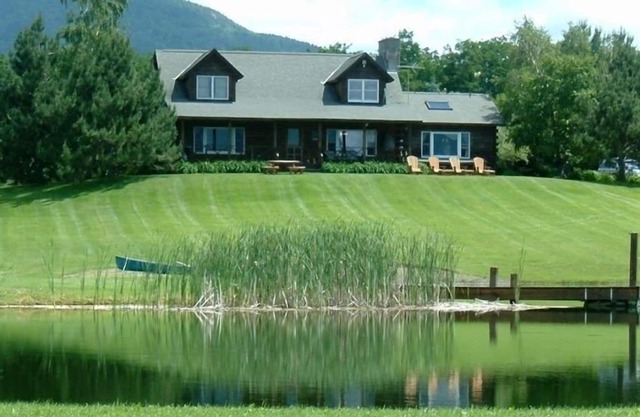 Private Country Log Home with Spectacular Views and Pond on 11 Acres