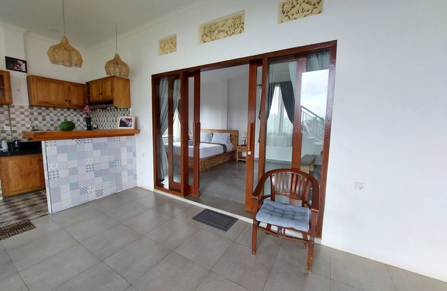 Private cozy bedroom with a spacious shared deck and spectacular view