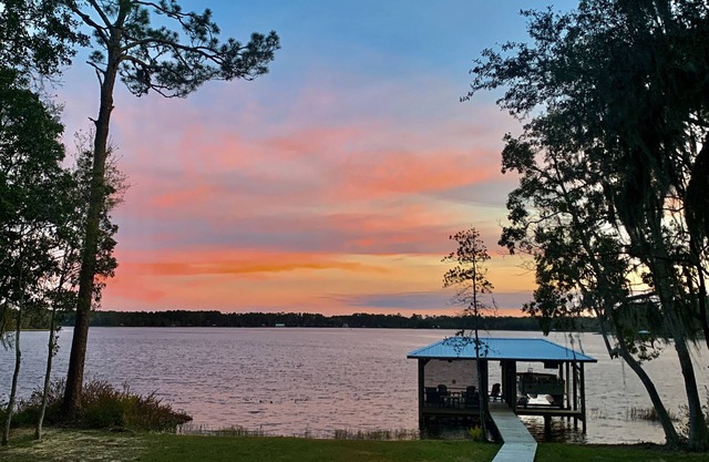 Private lakefront home w/large dock, pets welcome, Wi-Fi, kayaks, boat rental.