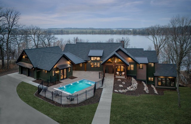 Private lakeside retreat with pool, hot tub, and sauna