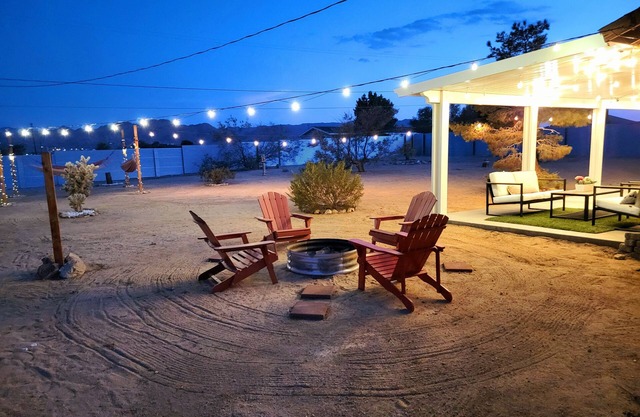 private peaceful fenced home with hot tub king bed, Firepit and more