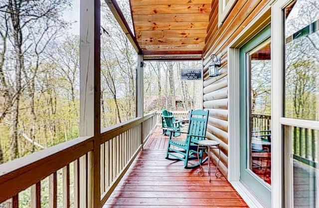 Private retreat amongst the trees with a deck, firepit, grill, AC, and W/D