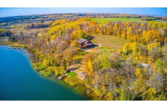 Private, Spacious, 10,000 Sq Ft Custom Built Lake Home w/Lakeside Cabin & 73 ac