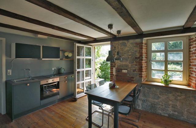 Quaint apartment with fireplace and sauna