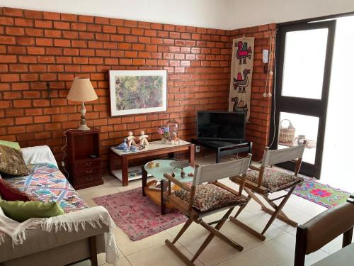 Quarto em casa aconchegante
