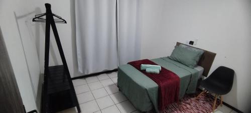 Quarto em casa de família