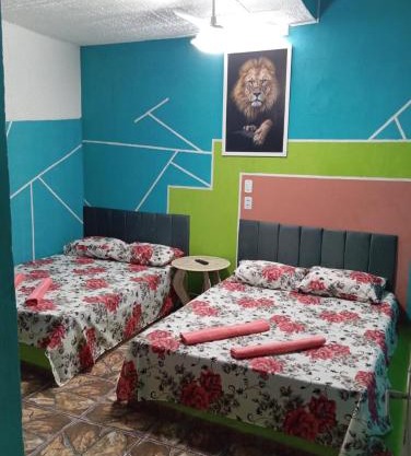 Quarto, garagem, portão automático, banheiro, wi-fi, tv, frigobar e ventilador de teto