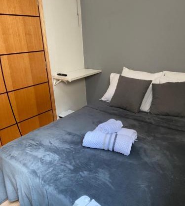 Quarto privativo no centro
