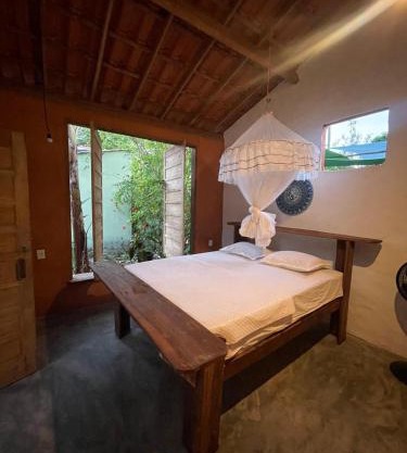 Quarto rustico próximo da praia de Moreré