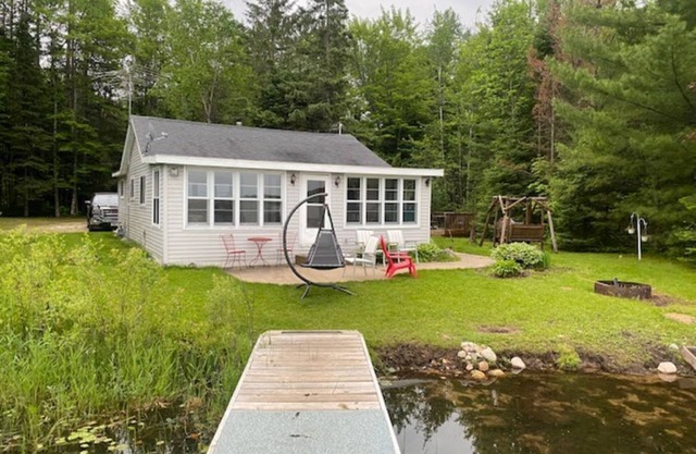 QUIET WATERFRONT CABIN JUST FEET FROM THE FULL REC LAKE