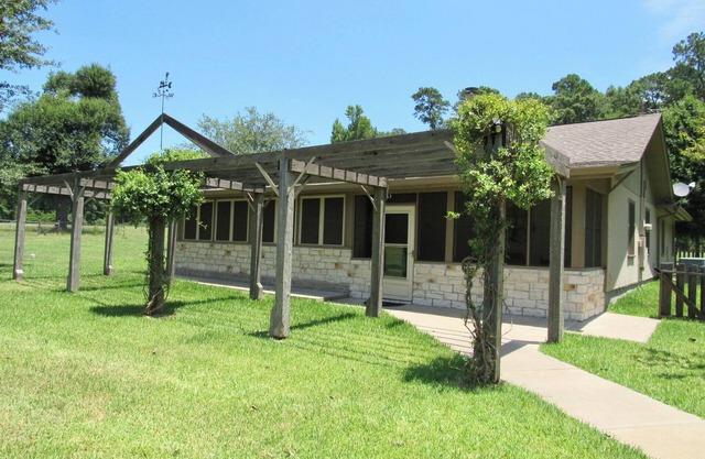 Ranch home situated on 48 acres with a beautiful pond
