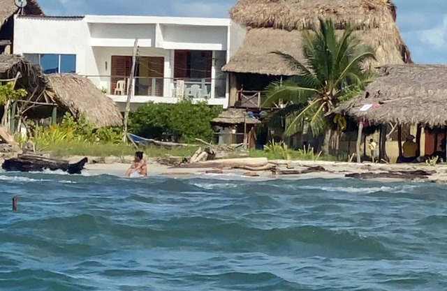 RED MOON HOUSE IN FRONT OF THE SEA