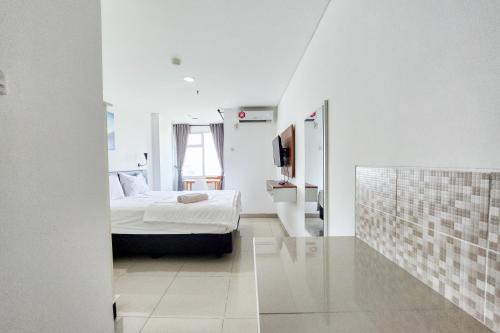 RedLiving Apartemen Enviro - Aurora Rooms