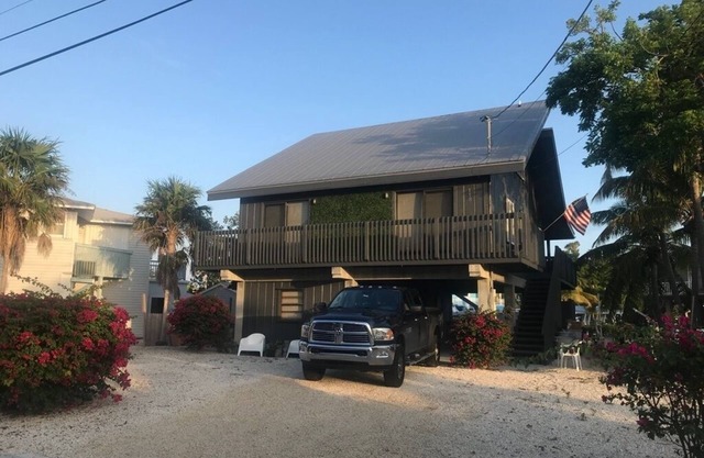 Relax And Get Away To This Prestine Keys Style Home