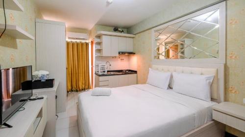 Relax and Homey Studio Room at Cinere Resort Apartment By Travelio