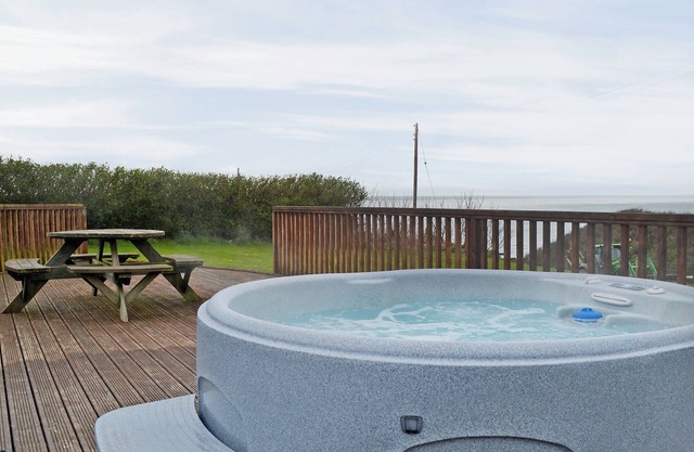 Relax and unwind in the blissful, private hot tub.