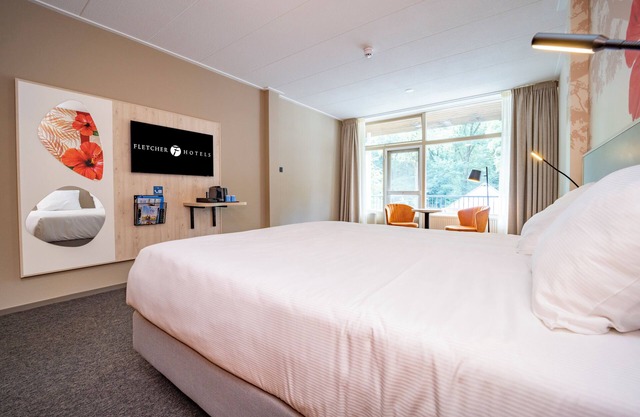 Relax in Comfort with Indoor Pool, Free Parking & Fun Games for All Ages