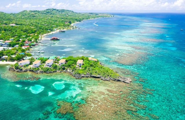Relax into luxury at our West End beachfront villa—with private pool