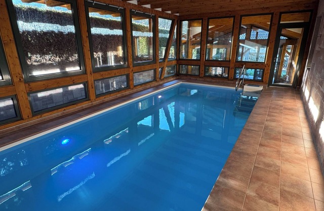 Relaxation in the forest - with swimming pool!
