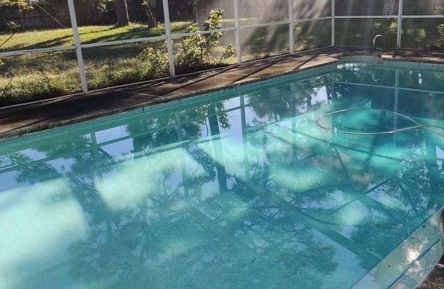 Remodeled studio in Rockledge, with sliders to pool and huge tropical yard.