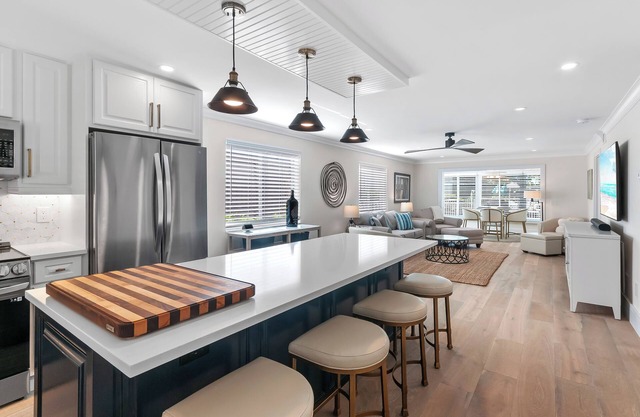 RENOVATED 2 Bed, 2 Bath 1st floor with heated pool on the bay!