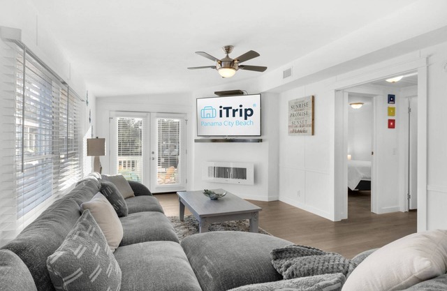 Renovated canal-front pet-friendly home with a fireplace and boat dock, steps away from the marina!