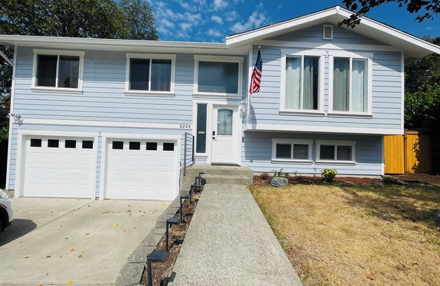 Renovated, modern home in a quiet area with a game room and spacious backyard