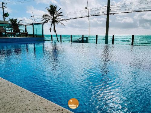 RESIDENCIAL VERANO - Pé na Areia, Piscina Borda Infinita, Vaga de Garagem, Portaria 24 hs