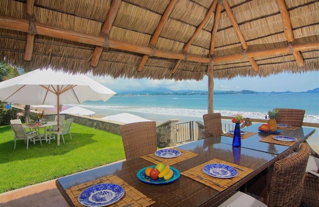 Right on beautiful sandy beach in gated community
