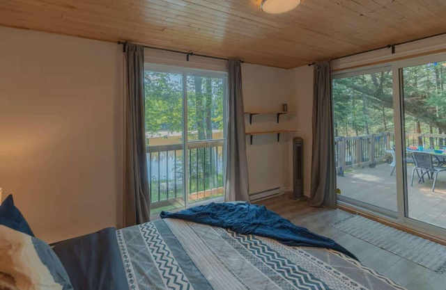 Riverfront Getaway with Hot Tub & Scenic Views