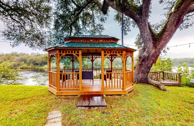 Riverfront home with amazing views, private dock, boat house & boat lift