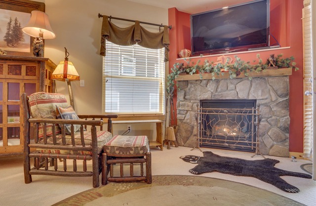 Riverfront mountain townhouse with pool & hot tub, patio, & easy ski access