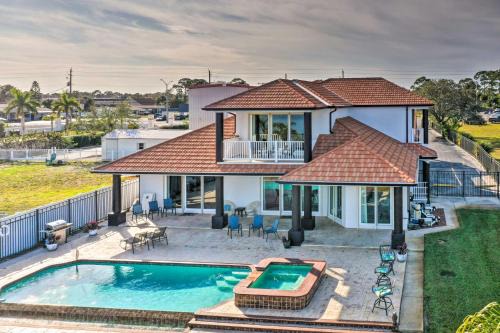 Riverfront Titusville Home with Pool and Pickleball!