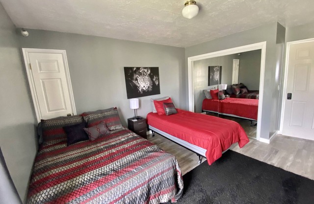 Rm #2. 1 double bed, 1 single bed smart TV, street/mountain view.