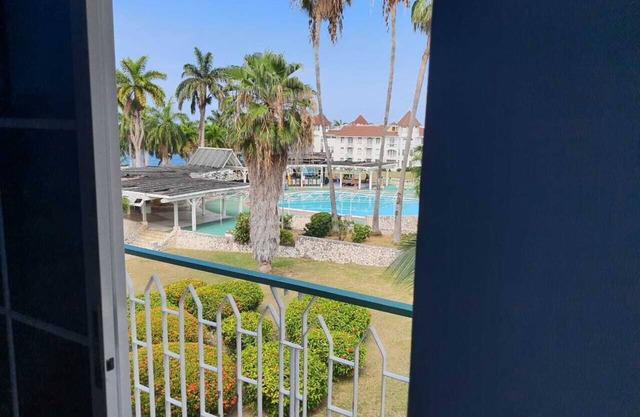 Romantic condo with private beach and pool