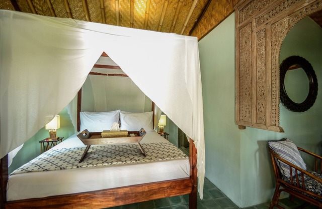 Romantic Private Villa facing the pool.Soft aqua handmade tiles and antiques.