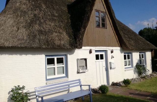 romantic thatched roof house with large garden