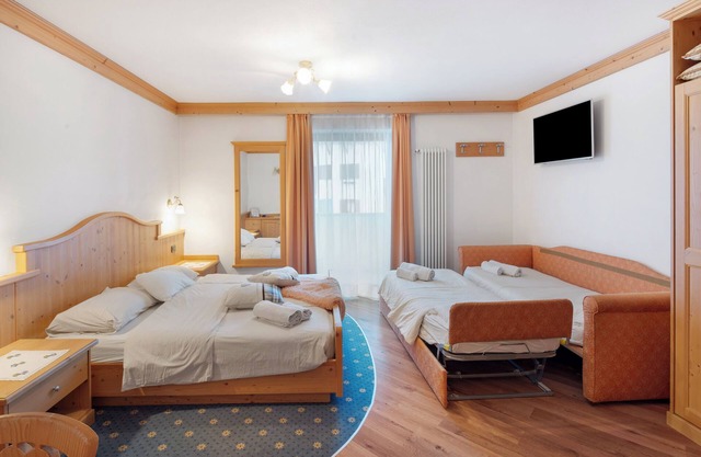 Room 'Camera Quadrupla Genzianella' with Mountain View, Shared Terrace and Wi-Fi