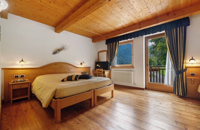 Room 'Camera Quadrupla N 1' with Mountain View, Shared Garden and Wi-Fi