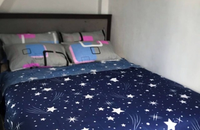 Room for Traveler'sCharming 1-bedroom apartment in fantastic Quezon City with AC