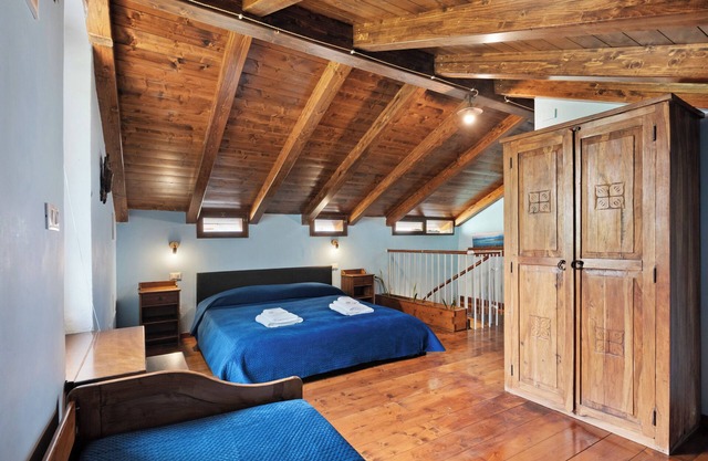 Room 'Matrimoniale Mansardata' with Shared Terrace, Wi-Fi and Air Conditioning